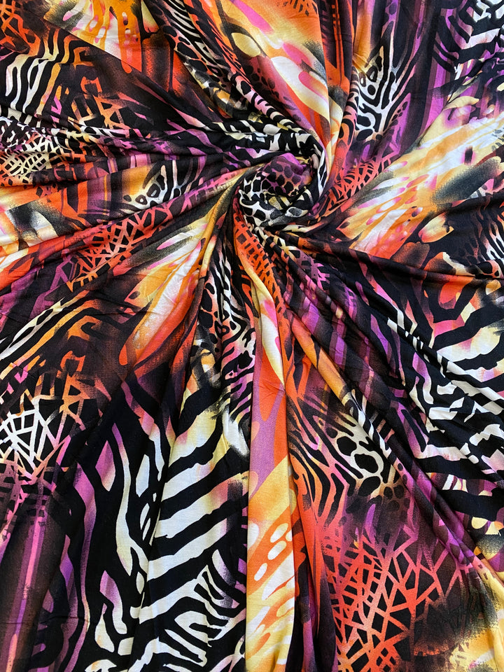 Warm Multi Animal Print |  Rayon Spandex Blend