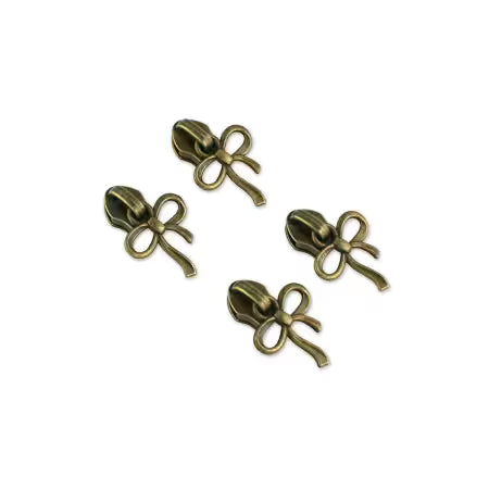 Four Bow Zipper Pulls in Antique
